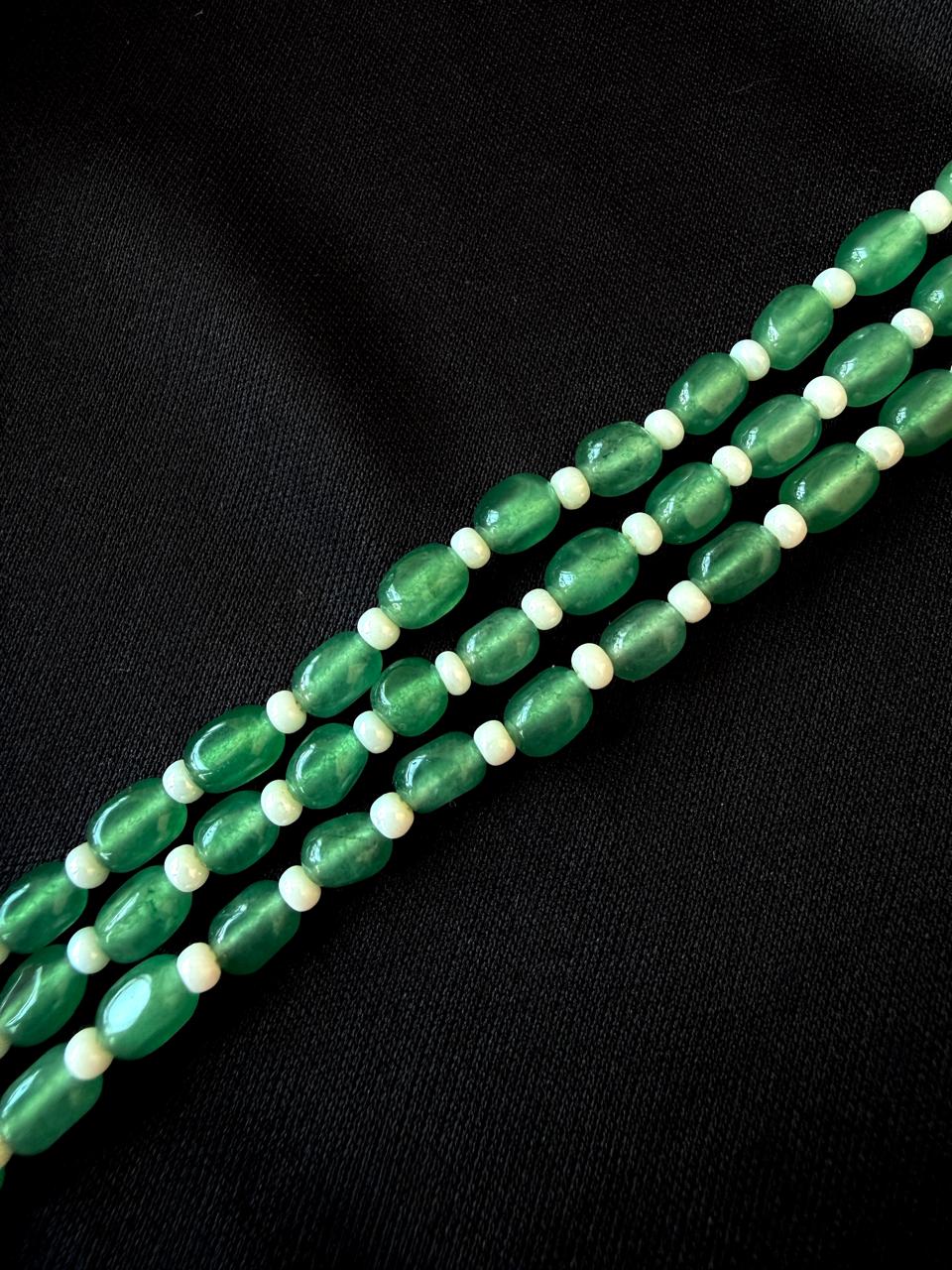 Green and white beaded necklace