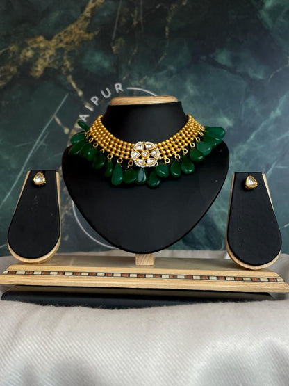 Kundan with semi precious stones golden choker with earring set